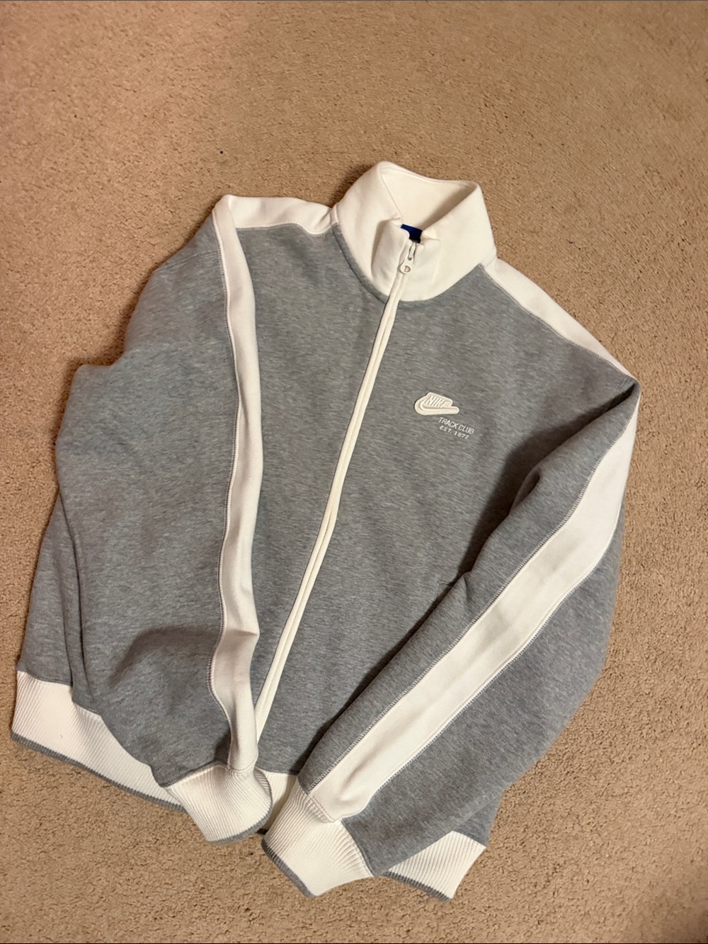 Nike women’s Grey and White Zip-Up Track Jacket